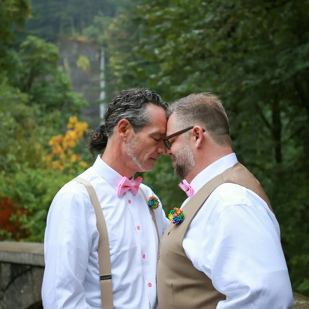 a couple of men kissing